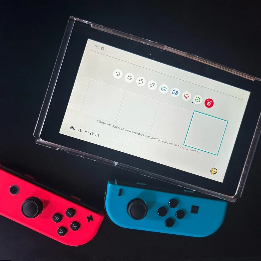 Nintendo Handheld Console with Red and Blue Controllers